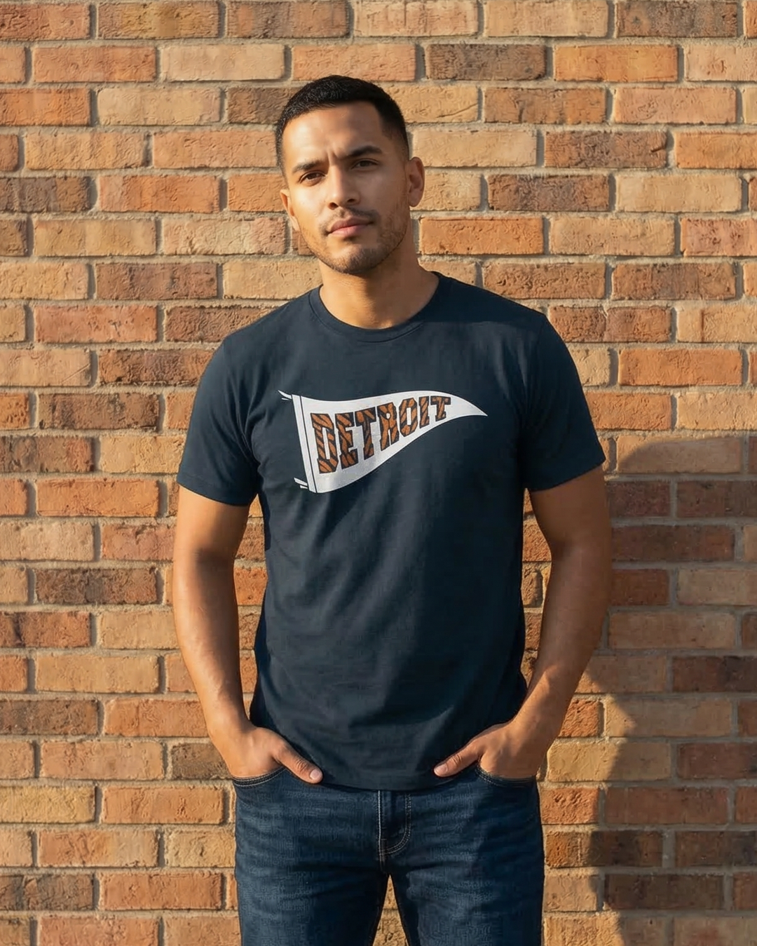 Male Model wering an Ink Detroit Tiger striped pennant tee 