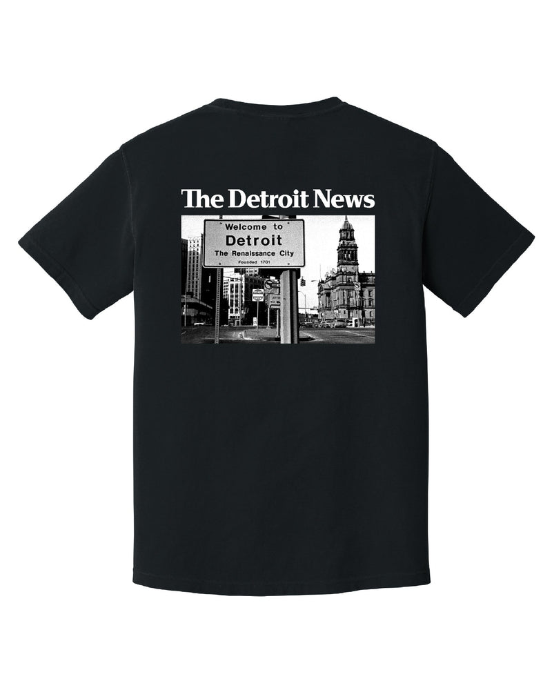 The Iconic Welcome to Detroit from the 60s on the back of a black T-Shirt. Photo from the Detroit News Archives